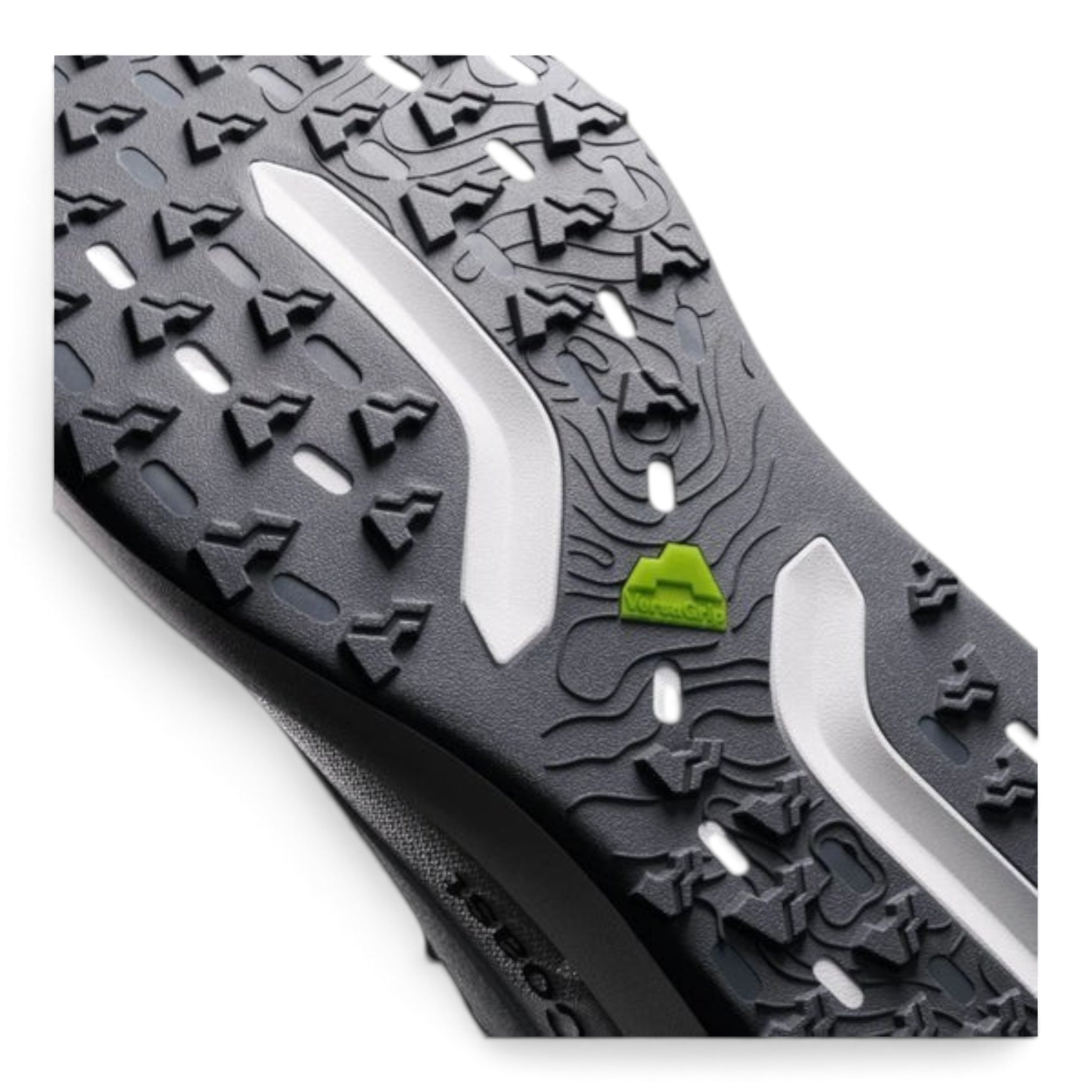 Endurance Edge H1 road-to-trail running shoe outsole with black VersaGrip traction lugs and green branding detail