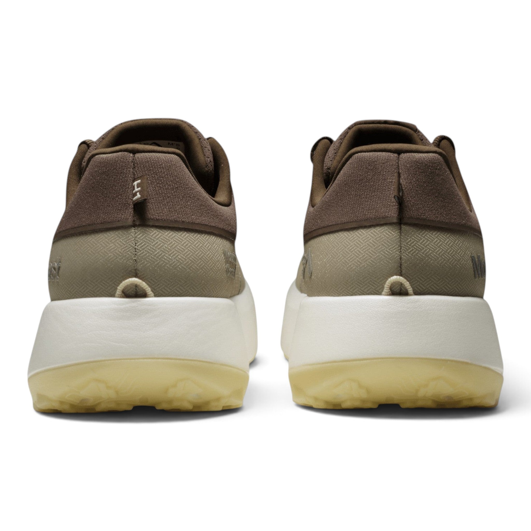 Endurance Edge Mount to Coast H1 running shoes in brown, showing the rear view of the sustainable midsole and outsole.