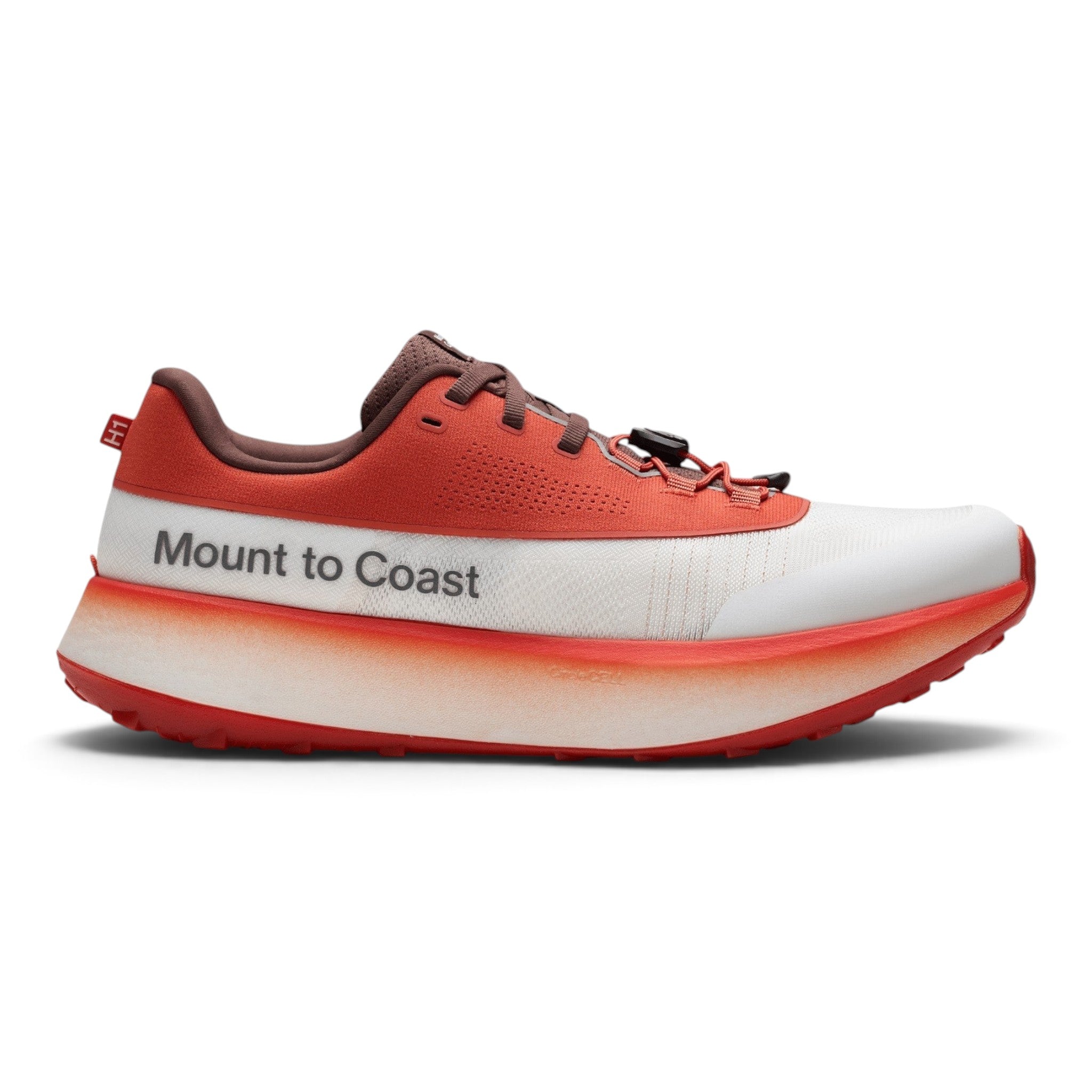 Endurance Edge H1 road-to-trail running shoe in orange and white with a thick CircleCELL midsole and dual lacing.