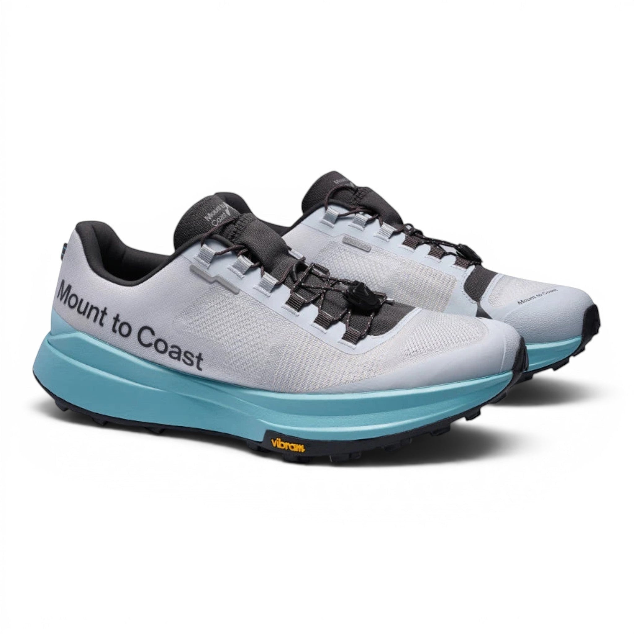 Endurance Edge T1 men's light grey trail running shoes with blue midsoles and black laces.